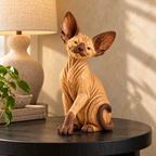 The Mischievous Sphynx hand-carved natural oak cat sculpture – styled home decor view